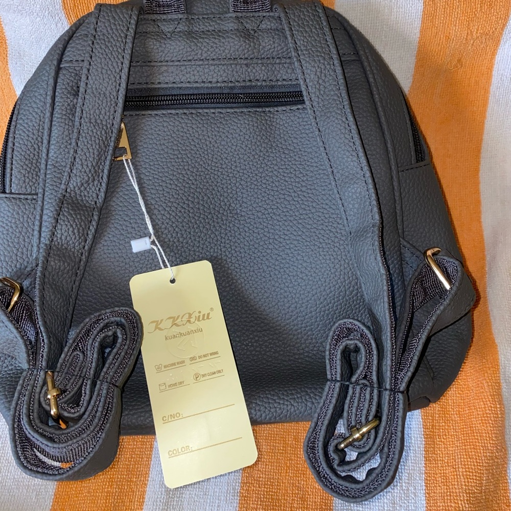 KKXIU brand brand new with tags on. 4 different zipper attachments to pick from